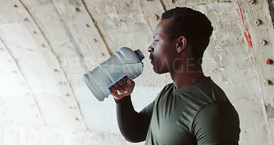 Exercise Break And A Black Man Drinking Water From A Bottle On The