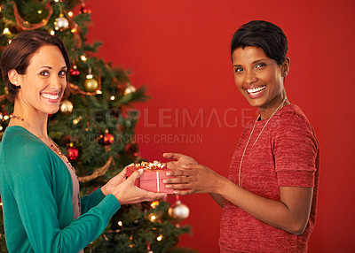 Buy stock photo Portrait, christmas or celebration as couple of women, gift or smile to thank you for friendship. Happy, female friends or box to exchange in gratitude, surprise or congratulations together in home