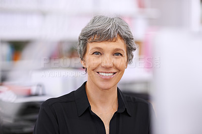 Buy stock photo Shot of a mature businesswoman in an office
