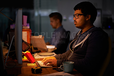 Buy stock photo Coding, computer and night with programmer man at desk in office for cyber security development. Fast food, programming and software with confident young game developer in workplace for overtime