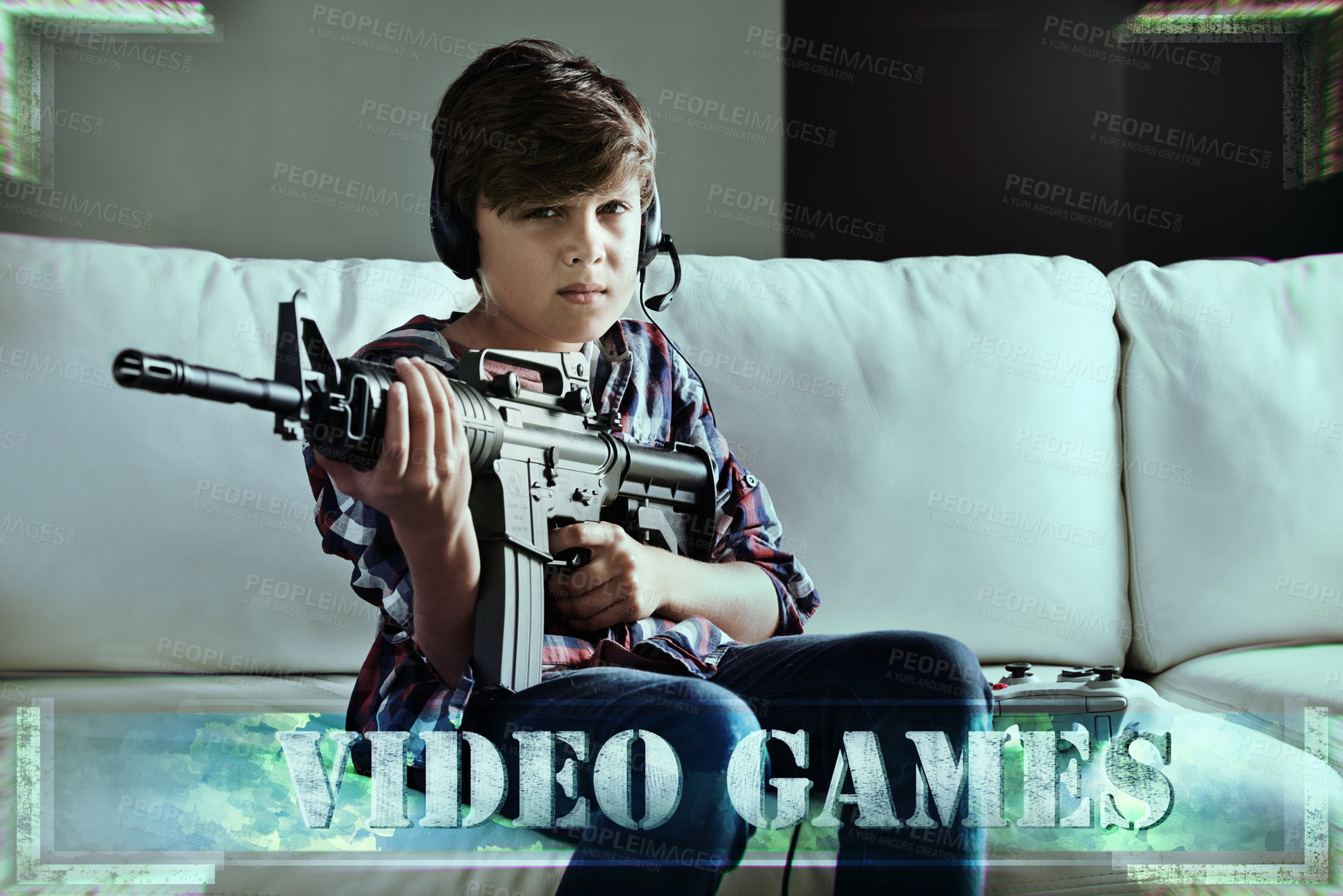 Buy stock photo Shot of a young boy playing violent video games