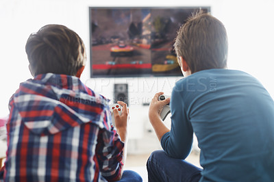 Buy stock photo Boys, back and video game, competition and gaming together at home, battle and action with console and TV. Young male children playing games, entertainment and esports, technology and fun challenge