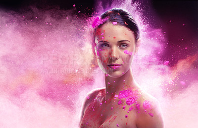 Buy stock photo Conceptual shot of a beautiful young woman covered in multi-colored powder paint