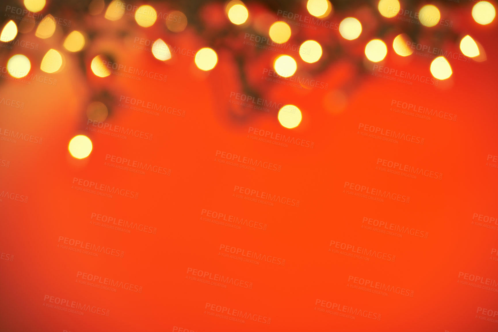 Buy stock photo Closeup shot of a string of Christmas lights on a red background with festive copyspace. Fairy light on a Christmas  festive blurred bokeh abstract background, in celebration and festive cheer 