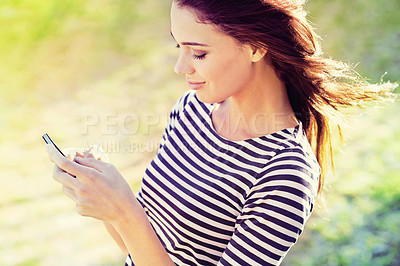Buy stock photo Woman, cellphone and social media for networking in nature and search for travel app for direction. Young person, smartphone or scroll for online shopping or reading message for update in countryside