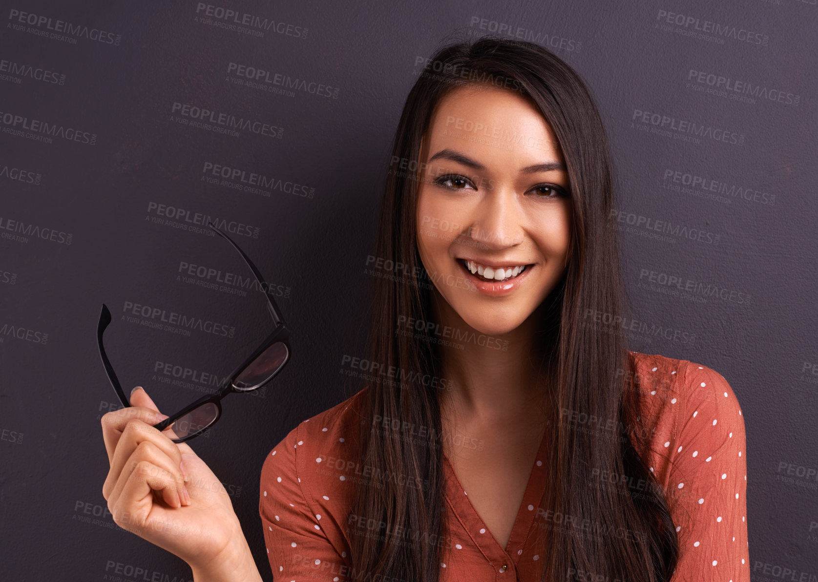 Buy stock photo Woman, portrait and glasses in studio for eye care prescription with confident smile, grey background or mockup space. Female person, vision and frame for healthy optometry, eye care or spectacles