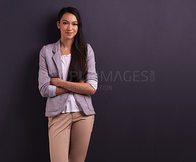 Buy stock photo Studio shot of an attractive young woman