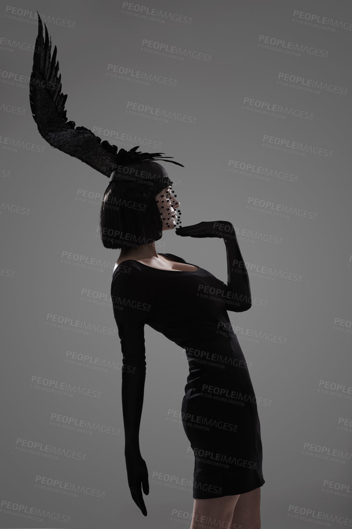 Buy stock photo Girl, feather and head for fashion in studio for fantasy or magic with unique creativity for art or illusion. Female person, isolated and white background for designer clothes, diva and surreal.