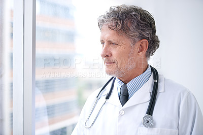 Buy stock photo Doctor, thinking and man at window in office planning future surgery or ideas for medical process in clinic. Medicine, innovation and mature surgeon remember a solution in healthcare and hospital