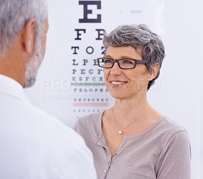 Buy stock photo Optometry, patient and optometrist consulting for eye test with frames, prescription lens and glasses for sight. Healthcare, ophthalmology and senior woman for wellness, vision and medical service