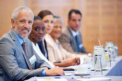 Buy stock photo Seminar, portrait and CEO with smile in meeting for business for discussion of stock market. Employees, women and male people in collaboration for strategy in sales, networking and talk with notes