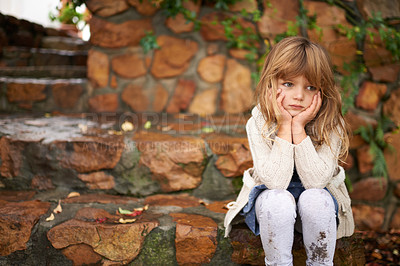 Buy stock photo Thinking, sad and girl child in a garden bored, waiting or disappointed, unhappy or moody outside. Children, problem and frustrated kid in a park lonely, moody or upset outdoor with angry or tantrum