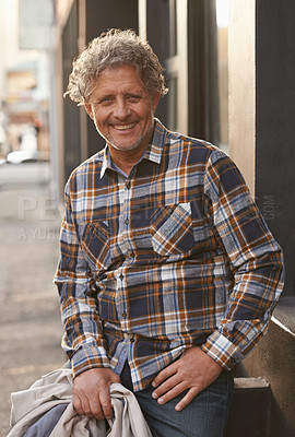 Buy stock photo Portrait of a friendly-looking middle aged man outside