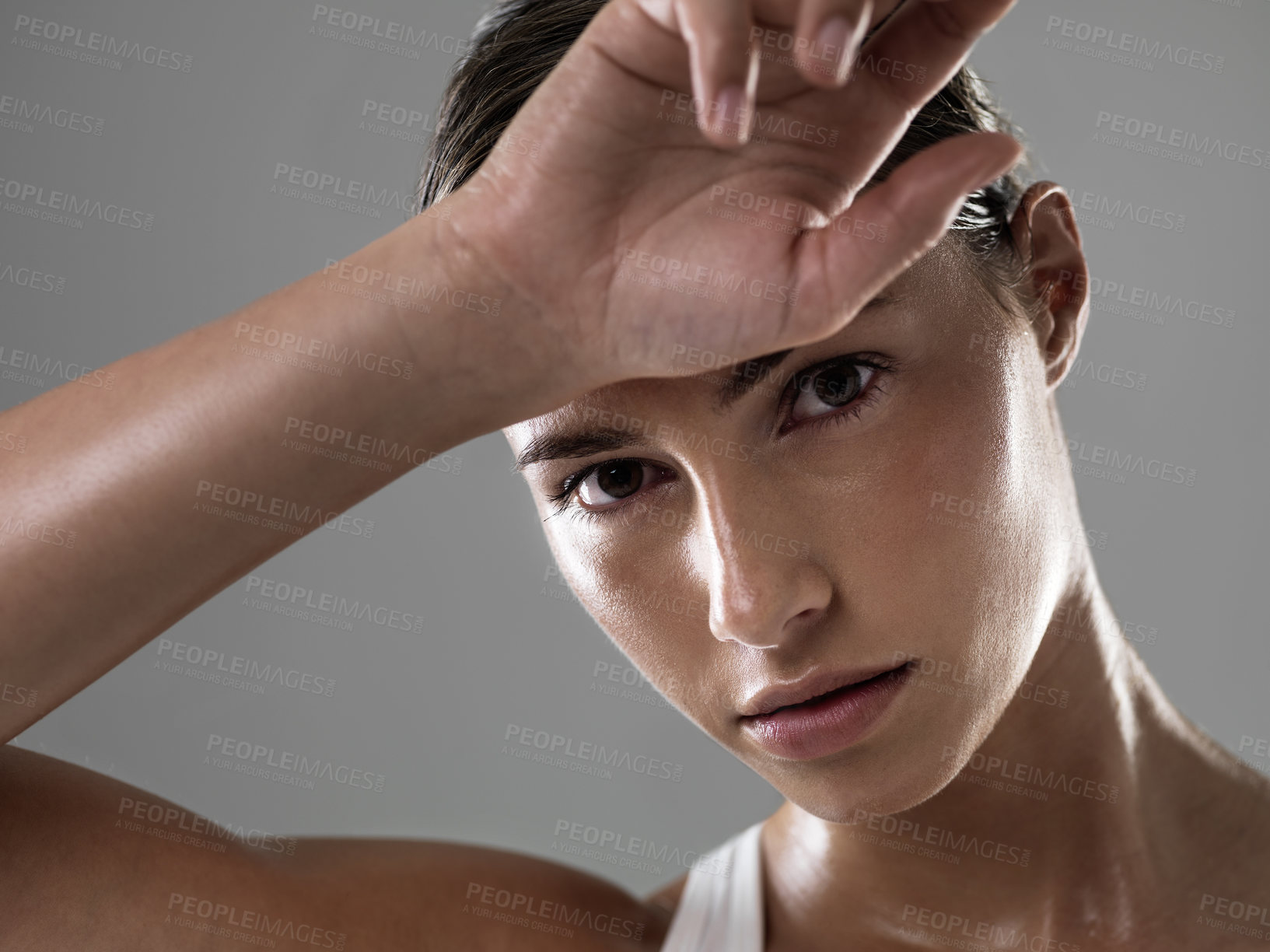 Buy stock photo Woman, hand and portrait for workout sweat in studio for physical activity, performance or grey background. Female person, face and exercise training for sports athlete or healthy, fitness or mockup