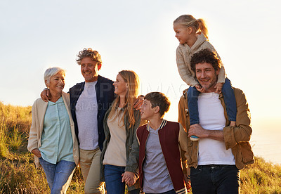 Buy stock photo Love, countryside and family bonding, smile and quality time with happiness, walking and relax. Grandparents, mother and happy father carry daughter, siblings and loving outdoor, break and adventure