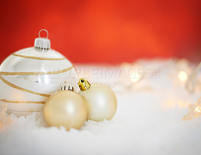 Buy stock photo Christmas, decor and interior with bauble for December holiday or festive season on snow or studio background. Closeup of house decoration with ball, ornament or creative equipment on mockup space