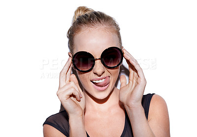 Buy stock photo Portrait, tongue out and sunglasses or trendy woman for fashion in studio or positive and isolated on white background. Face, female model and crazy or smiling hipster or glamour and lipstick