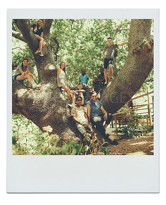 Buy stock photo Portrait, frame and tree with group, sunshine and friends in a park with weekend break and bonding together. Youth development camp, nature and forest with fun and summer with happiness and holiday