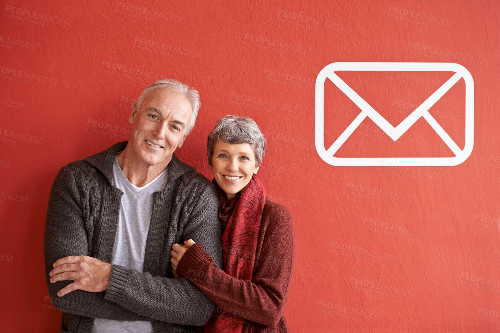 Buy stock photo Happy, portrait and senior couple in studio with notification icon for message or email to connect together. Man, woman and red background with popup for contact or social media and communication.