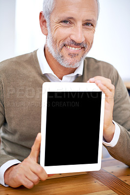 Buy stock photo Portrait, tablet screen and smile of man showing mockup space at desk in office of business manager. Face, display and person with technology for advertising, marketing or promo of mature consultant