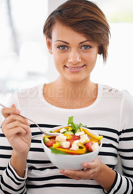 Buy stock photo Woman, salad and healthy food in portrait for diet with detox, breakfast and lunch at home. Young person eating vegetables, lettuce and green fruit or vegan meal in bowl for nutrition and wellness