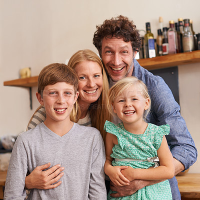 Buy stock photo Parents, family and portrait with children in kitchen for holiday relax or together for weekend, good mood or bonding. Mother, father and siblings or face in apartment for happy, vacation or break