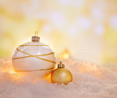 Buy stock photo Christmas, lights and balls for decoration on snow with mockup space in winter on a background closeup. Xmas, cold weather and festive sphere, baubles or ornaments for holiday celebration at party