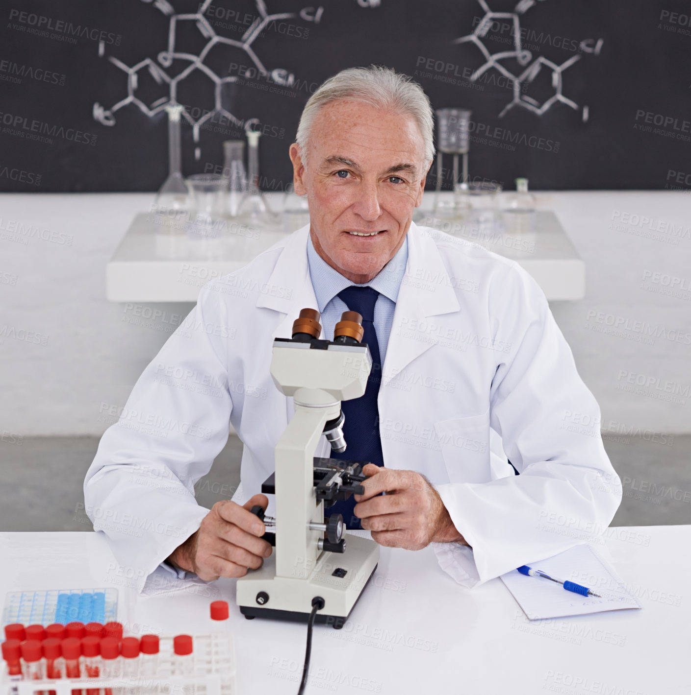 Buy stock photo Scientist, man and portrait with microscope in lab for vaccine study, development or dna test. Mature doctor, smile and biotechnology for bacteria sample, medical research or growth in chemistry