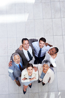 Buy stock photo Business people, portrait and huddle for team hug in office, community and support or unity. Colleagues, diversity and collaboration in embrace in workplace, solidarity and above for cooperation