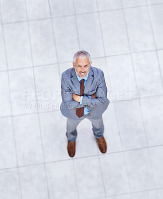 Buy stock photo High angle, portrait and happy man with arms crossed in business or office with confidence and pride. Mature, entrepreneur and above person in lobby excited for morning in London at workplace