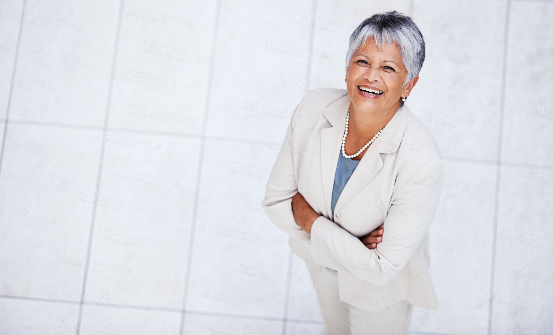 Buy stock photo Business, portrait and high angle of woman with arms crossed in office with professional confidence and pride. Above, entrepreneur and happy mature person in lobby excited for morning at workplace