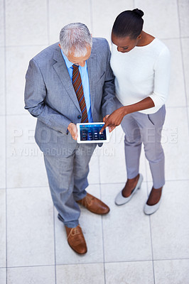 Buy stock photo Businessman, black woman and employees with tablet in office for internet, email and planning for business meeting. Manager, assistant and team with diversity from above view with digital pad