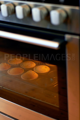 Buy stock photo Cupcake in oven, dessert and bakery confectionery closeup, production and food with sweet baked goods. Luxury snack, baking process with hospitality and catering industry, cake and kitchen appliance