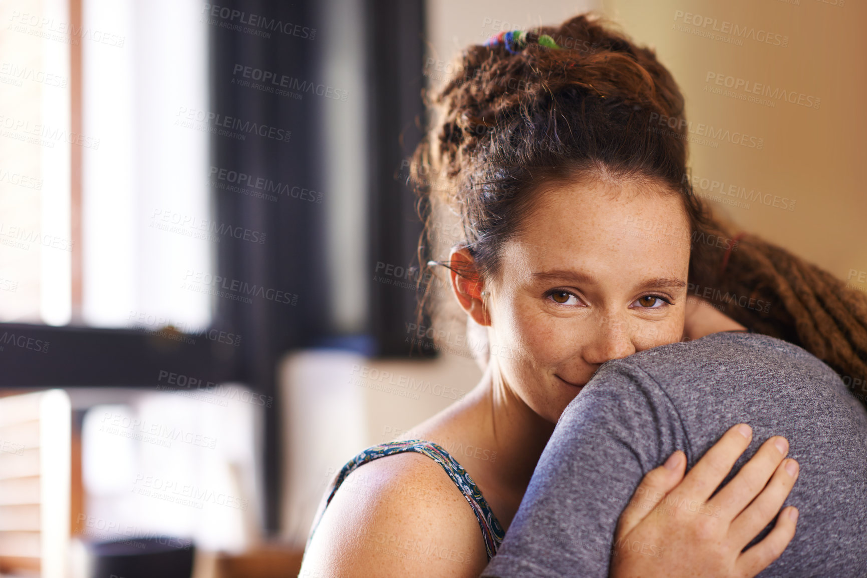 Buy stock photo Portrait, couple and hug for love or commitment with romance for relationship, affection and connection for dating anniversary. Female person and man in home together for bonding, security and care.