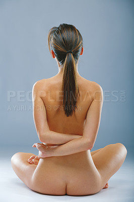 Buy stock photo Rearview studio shot of a beautiful naked woman doing yoga