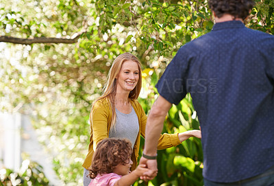 Buy stock photo Happy family, holding hands and child dance outdoor or play game in summer together in a circle at park. Ring a rosy, smile and kid in garden on holiday, vacation and bonding with mother in nature