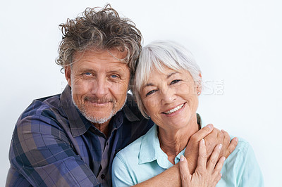 Buy stock photo Portrait of an affectionate senior couple on a white background