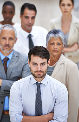 Buy stock photo Portrait, leadership and group of business people with solidarity, confidence or serious at startup. Community, professional men and women together in office with teamwork, pride and trust in manager
