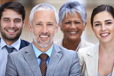 Buy stock photo Shot of a group of confident businesspeople