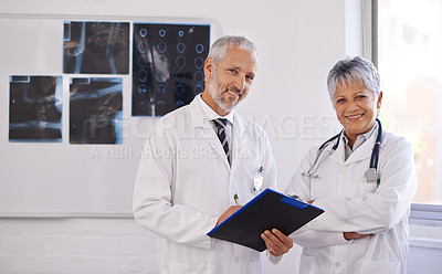 Buy stock photo Doctors, checklist and portrait in hospital with collaboration for medical advice, support and xray results. Healthcare, radiology and mature people with teamwork for schedule, consultation or review