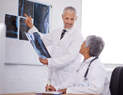 Buy stock photo Senior team of doctors, study xray for surgery and people in radiology with healthcare in clinic. Review anatomy scan, old man and woman surgeon collaboration with assessment and problem solving