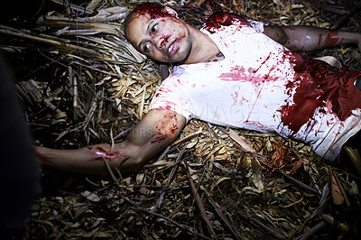 Buy stock photo A cropped shot of a murder victim found outdoors