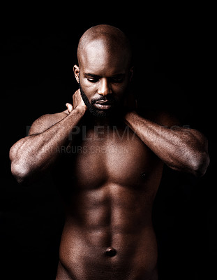 Buy stock photo Studio shot of a muscular man closing his eyes while holding his neck