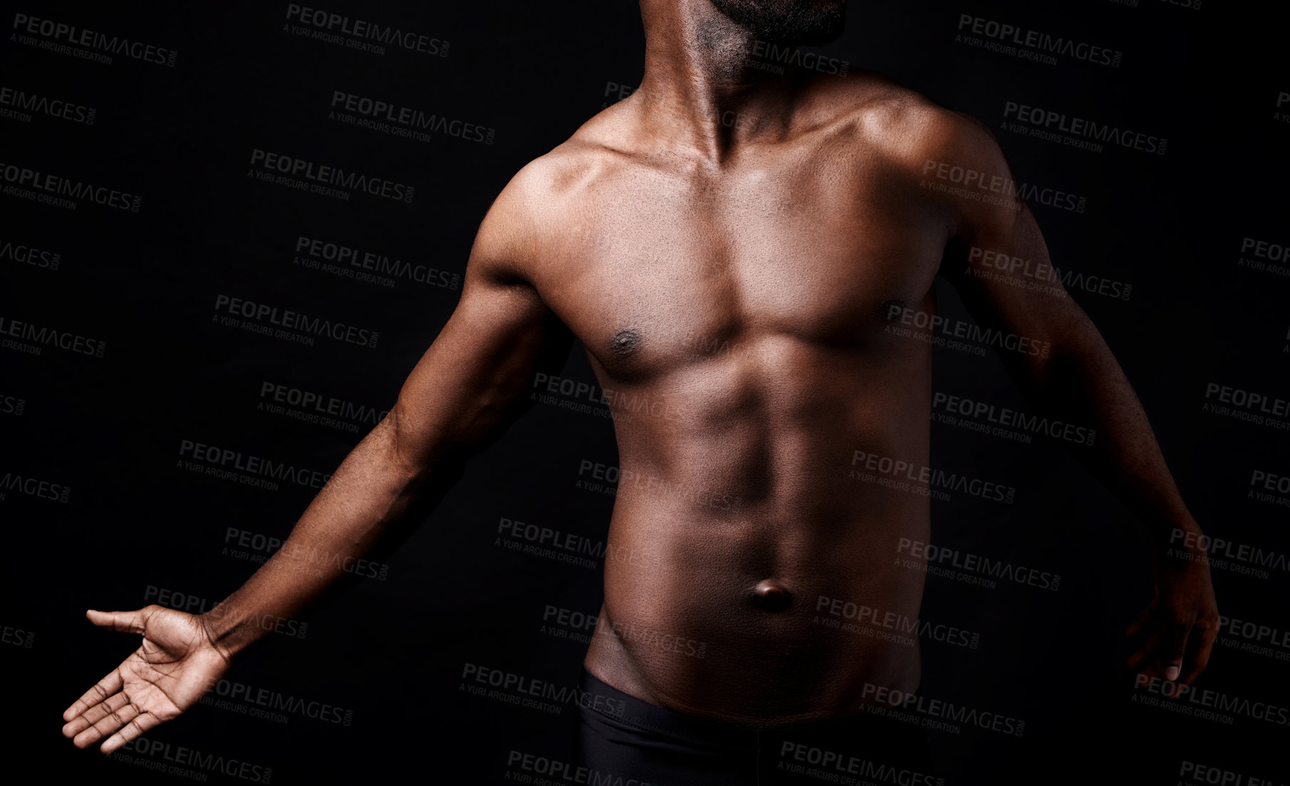 Buy stock photo Black man, fitness and muscle with shadow for exercise or workout on a dark studio background. Closeup of young African male person or bodybuilder with masculine or muscular figure on mockup space