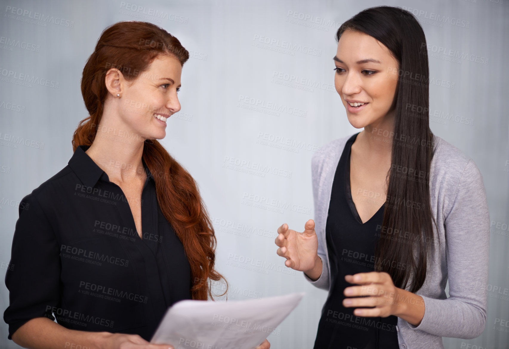 Buy stock photo Women, document or discussion of startup, business or administration to plan project communication. Businesswomen, paper or talking of corporate, collaboration strategy in professional office