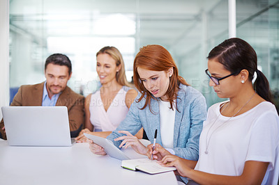 Buy stock photo Shot of a team of coworkers  strategising