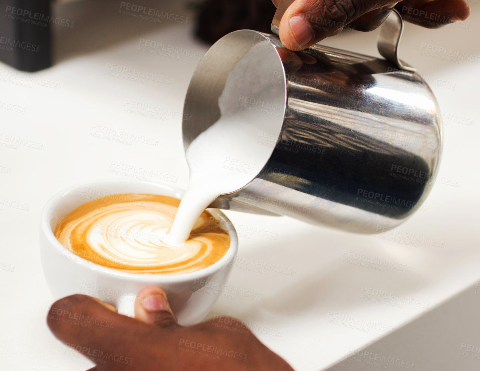 Buy stock photo Coffee, closeup hand of a barista and pouring milk in a cup in a cafe in the morning. Latte or cappuccino, cafeteria and hands of a person pour a hot beverage for expresso drink at kitchen counter