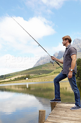 Buy stock photo Fishing, pole and man in nature for travel, break or stress relief at a lake on vacation, holiday or trip. Fish, line and calm male person at outdoor river for water, adventure or peace in a forest