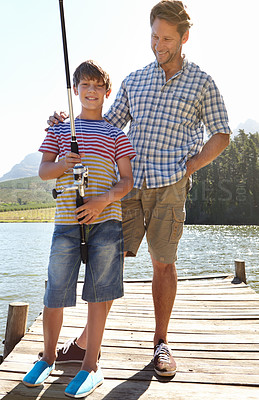 Buy stock photo Fishing, lake or pole by father and son in nature bonding, vacation or travel adventure outdoor. Family, love and kid with dad at a river for learning, teaching or sustainable living while camping