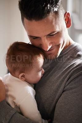 Buy stock photo Father, baby and smile with hug for bonding, love and happiness with child development and parenting. Peace, calm and childhood with connection, man and newborn kid for tender moment at family home